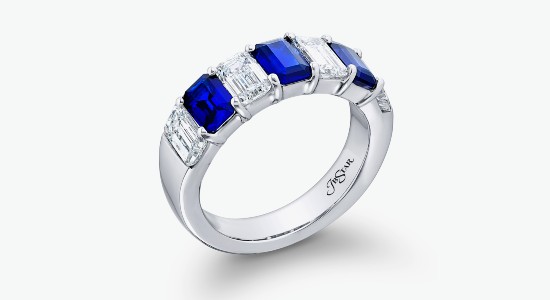 a platinum ring with sapphires and diamonds