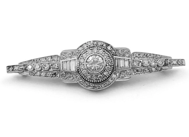 Alson Estate Collection Platinum Art Deco Style with Milgrain Detail Brooch, Featuring a .50ct Round Diamond, 72 Round Diamonds =.70ctw and 6 Baguette Diamonds =.30ctw, H Color, SI1 Clarity | Alson Jewelers