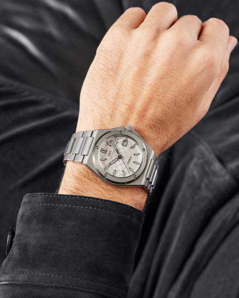 a man wearing an IWC watch