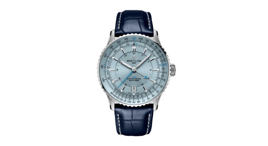 a silver and blue watch by Breitling