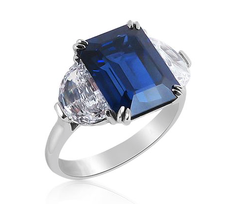 Alson Signature Collectin Ring, Fashioned in Platinum, Featuring a 5.51 Carat Emerald Cut Blue Sapphire, Non-Heated, AGTA Certified, Accented with Two Half Moon Diamonds =1.08cts Total Weight, VS2 Clarity, G Color | Alson Jewelers