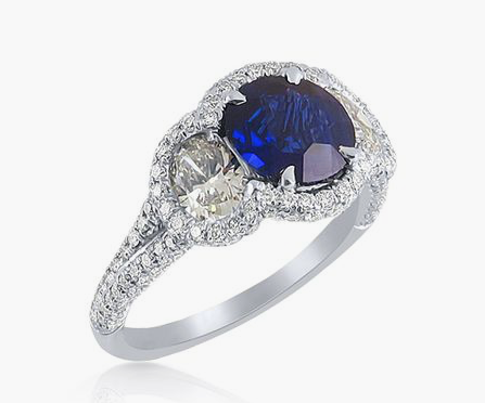 J.B. Star Platinum Blue Sapphire & Diamond Ring, Featuring a 1.52 Carat Round Blue Sapphire, Accented with 2 Oval and Pave Set Round Diamonds =1.78cts Total Weight | Alson Jewelers