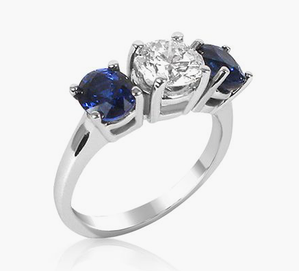 Alson Signature Collection Ring, Fashioned in 18K White Gold, Featuring a .95 Carat Round Diamond, SI1 Clarity, H Color, Accented with Two Oval Blue Sapphires =2.00cts Total Weight | Alson Jewelers